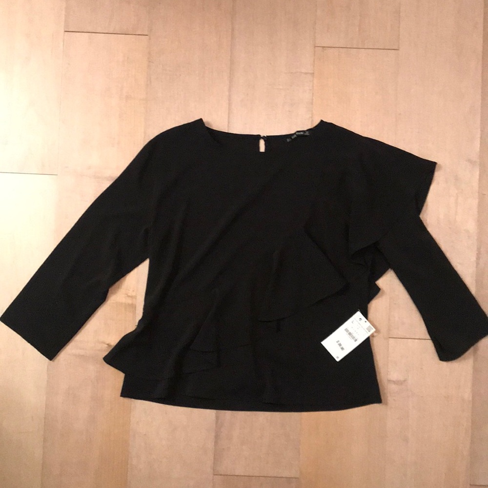 Black long sleeve work top with frill